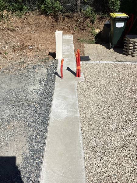 Réalisation d'une longrine béton pour portail coulissant à Francheville